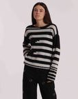 - Maglione mimi
Fantasia a righe con dettaglio in paillettes - AFAN-3758