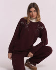 -  FELPA CON DETTAGLI TRAFORATI E STRASS  -  sfap-1196